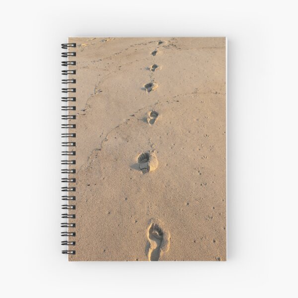 Bare footprints on the coastal sand Spiral Notebook
