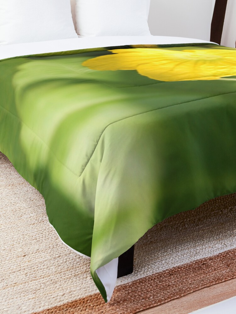 Alternate view of Yellow unnamed flower on a background of green leaves Comforter