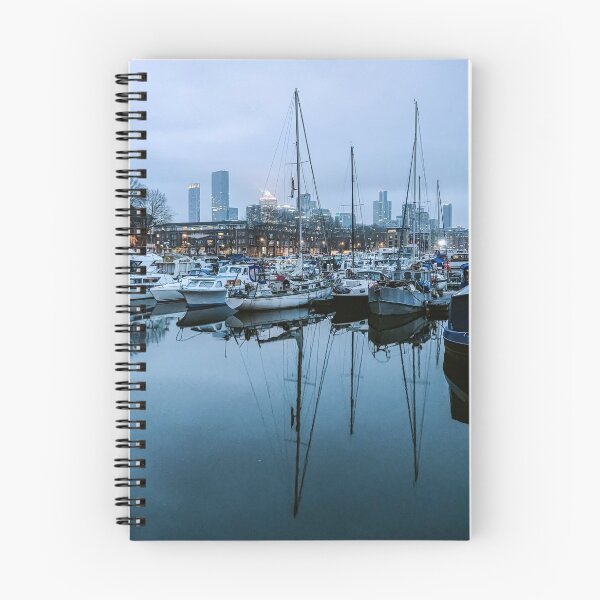 Item preview, surrey quays docks london canary wharf boat boats sailing docked sail towers photo water reflection blue cold winter cloudy designed and sold by am-mantilla2156.