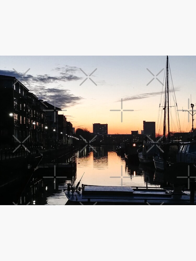 "surrey quays docks london boat view sunset boats winter cold yellow water reflection skyline