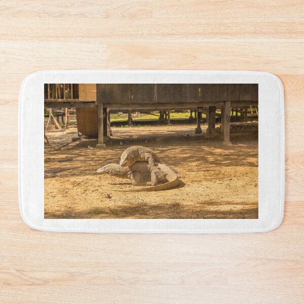 Item preview, Two Komodo dragons fighting at a village on Rinca Island, Indonesia designed and sold by SnapTPhotograph.