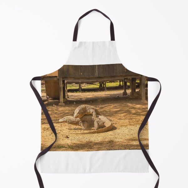 Item preview, Two Komodo dragons fighting at a village on Rinca Island, Indonesia designed and sold by SnapTPhotograph.