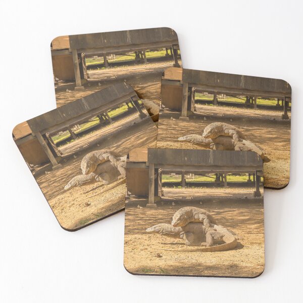 Item preview, Two Komodo dragons fighting at a village on Rinca Island, Indonesia designed and sold by SnapTPhotograph.