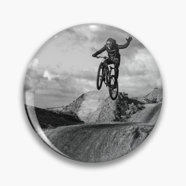 Item preview, Sports - MTB mountainbike one hand jump on a dirt track  in black & white designed and sold by Johan Opdenacker.