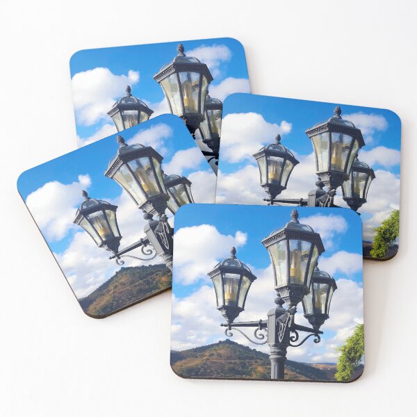 Item preview, Vintage street light in the Andalucian countryside with vivid blue sky and hills. designed and sold by janesg.
