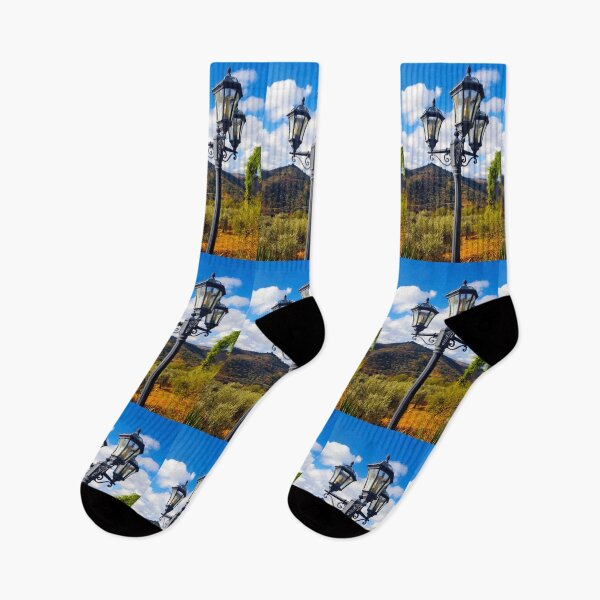 Item preview, Vintage street light in the Andalucian countryside with vivid blue sky and hills. designed and sold by janesg.