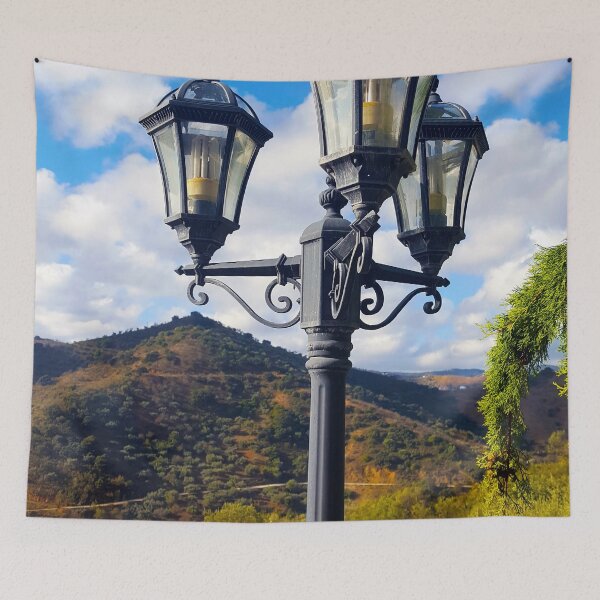 Item preview, Vintage street light in the Andalucian countryside with vivid blue sky and hills. designed and sold by janesg.