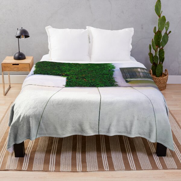 Item preview, Beautiful cantilevered bench in a white marbles sitting area with lush green plants at Malaga harbour. designed and sold by janesg.