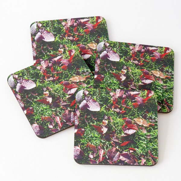 Item preview, Bright red cherry leaves on lush green grass. designed and sold by janesg.