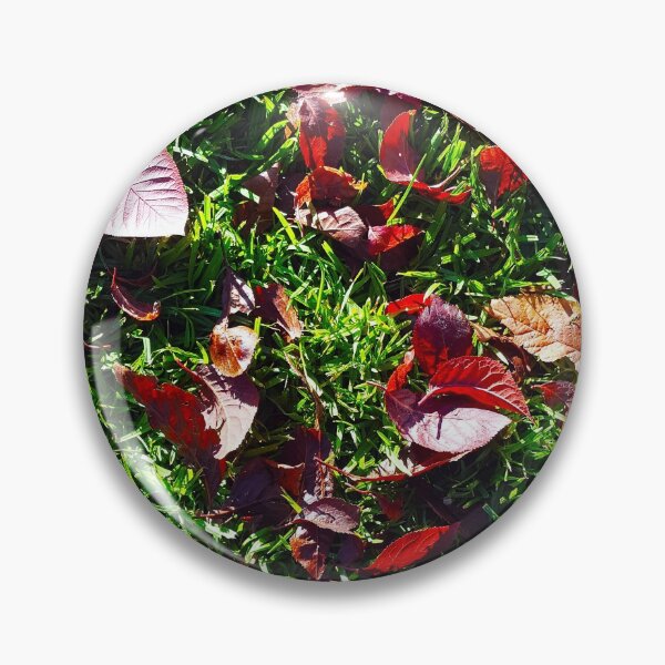 Item preview, Bright red cherry leaves on lush green grass. designed and sold by janesg.
