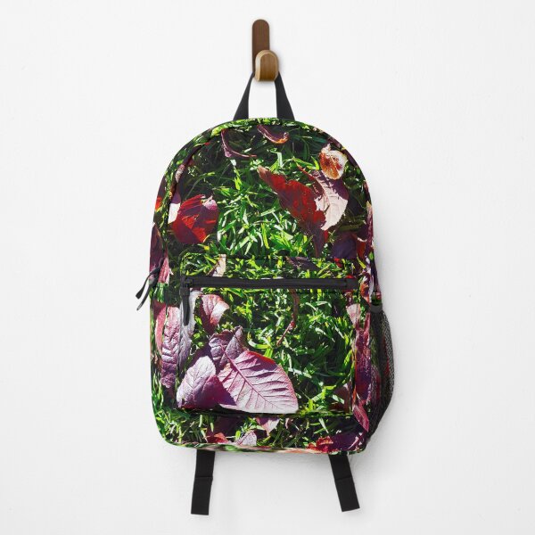 Item preview, Bright red cherry leaves on lush green grass. designed and sold by janesg.
