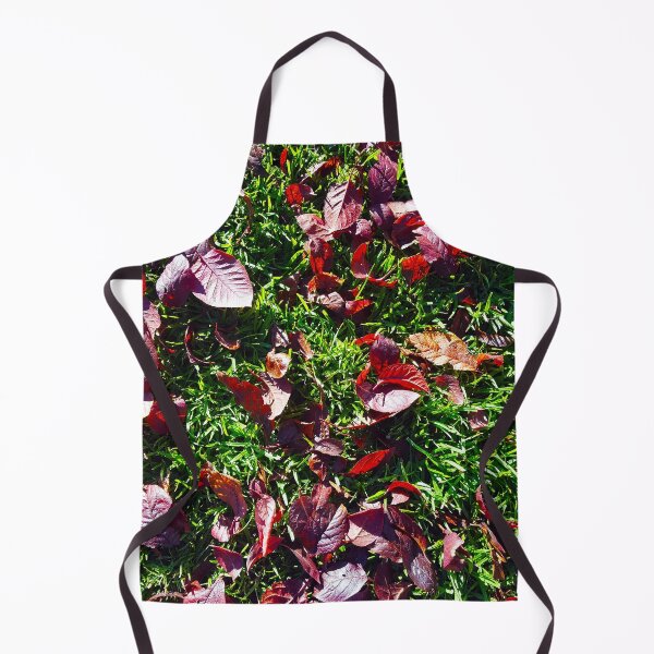 Item preview, Bright red cherry leaves on lush green grass. designed and sold by janesg.