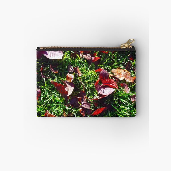 Item preview, Bright red cherry leaves on lush green grass. designed and sold by janesg.
