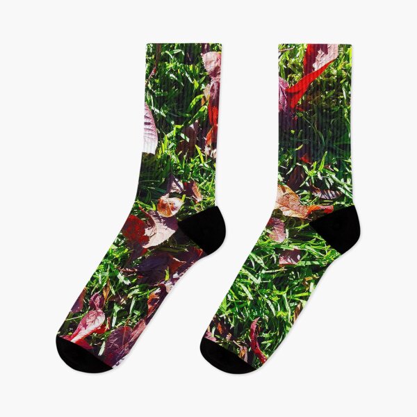 Item preview, Bright red cherry leaves on lush green grass. designed and sold by janesg.