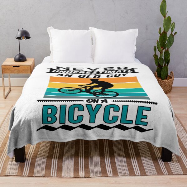 Item preview, Never Underestimate an Old Guy On A Bicycle designed and sold by Artsy Aura ⭐⭐⭐⭐⭐ .