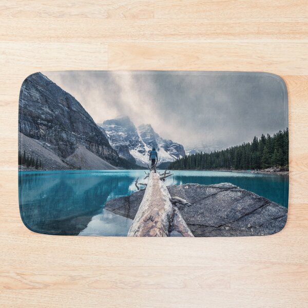 Item preview, Man Standing On The Log Between The Lake In Winter designed and sold by JTS STORE.