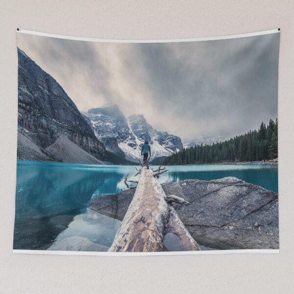 Item preview, Man Standing On The Log Between The Lake In Winter designed and sold by JTS STORE.