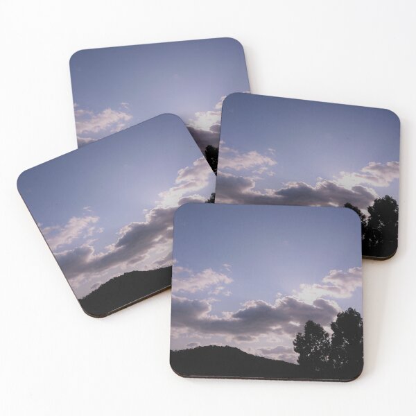 Item preview, The landscape of tree silhouettes under a cloudy sky designed and sold by moongmakes.