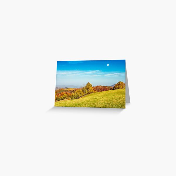 moon above autumn landscape with grassy meadow Greeting Card