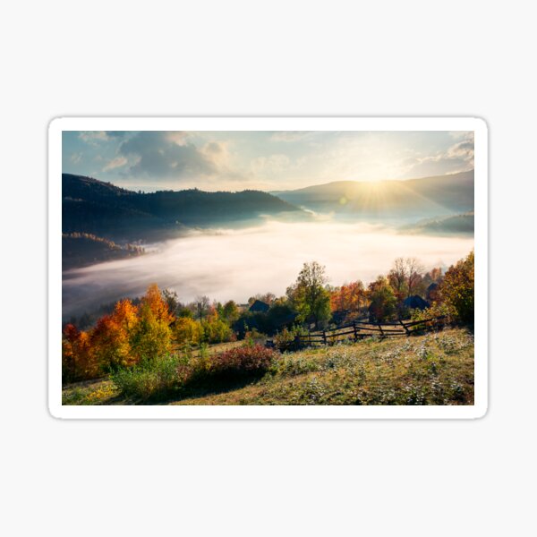 orchard near the village on hill side Sticker