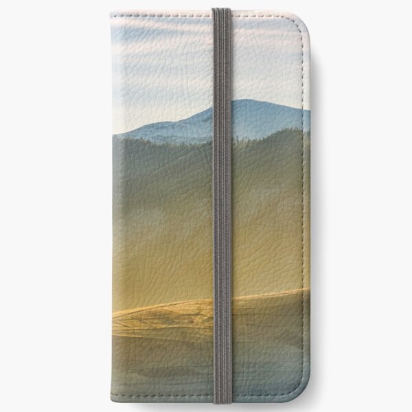 rural hill in glowing fog iPhone Wallet