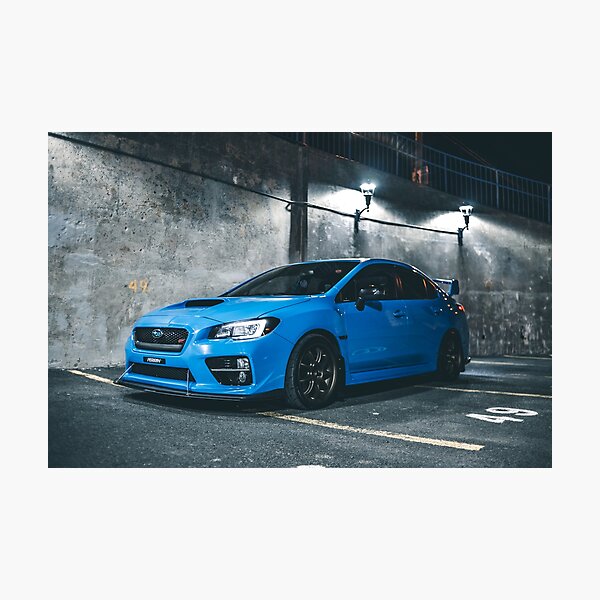 Hyper blue wrx sti parked at night Photographic Print