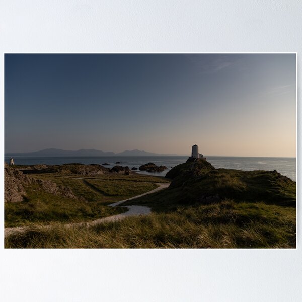 Item preview, Sunset over the Twr Mawr Lighthouse on Llanddwyn, Anglesey with Snowdonia on the horizon designed and sold by donandhiscamera.