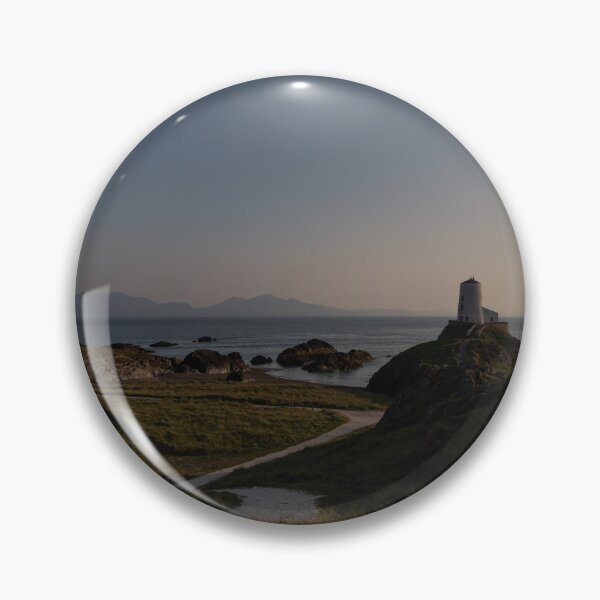 Item preview, Sunset over the Twr Mawr Lighthouse on Llanddwyn, Anglesey with Snowdonia on the horizon designed and sold by donandhiscamera.