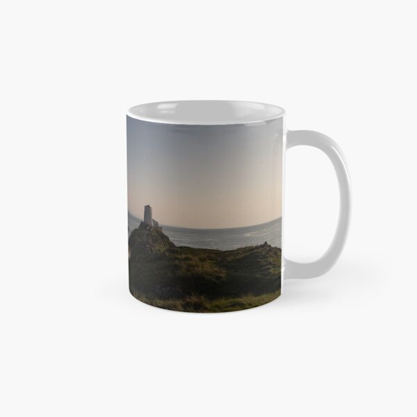Item preview, Sunset over the Twr Mawr Lighthouse on Llanddwyn, Anglesey with Snowdonia on the horizon designed and sold by donandhiscamera.