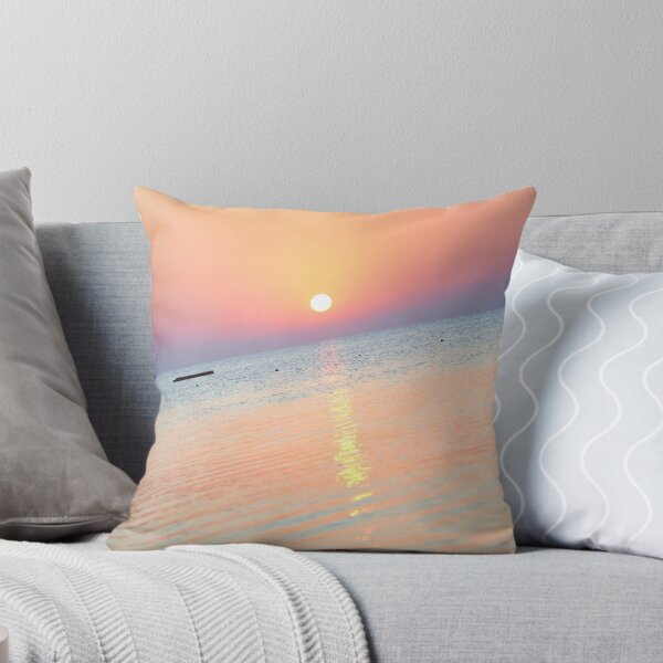 Item preview, Orange sunset above sea with boat amazing Golden reflection of the sun on the calm waves designed and sold by RaimondKlavins.