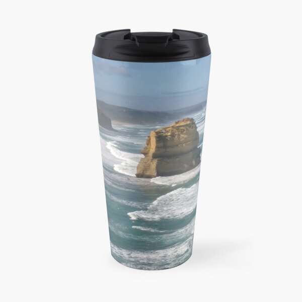 Sunlit Twelve Apostles in wild weather Travel Mug