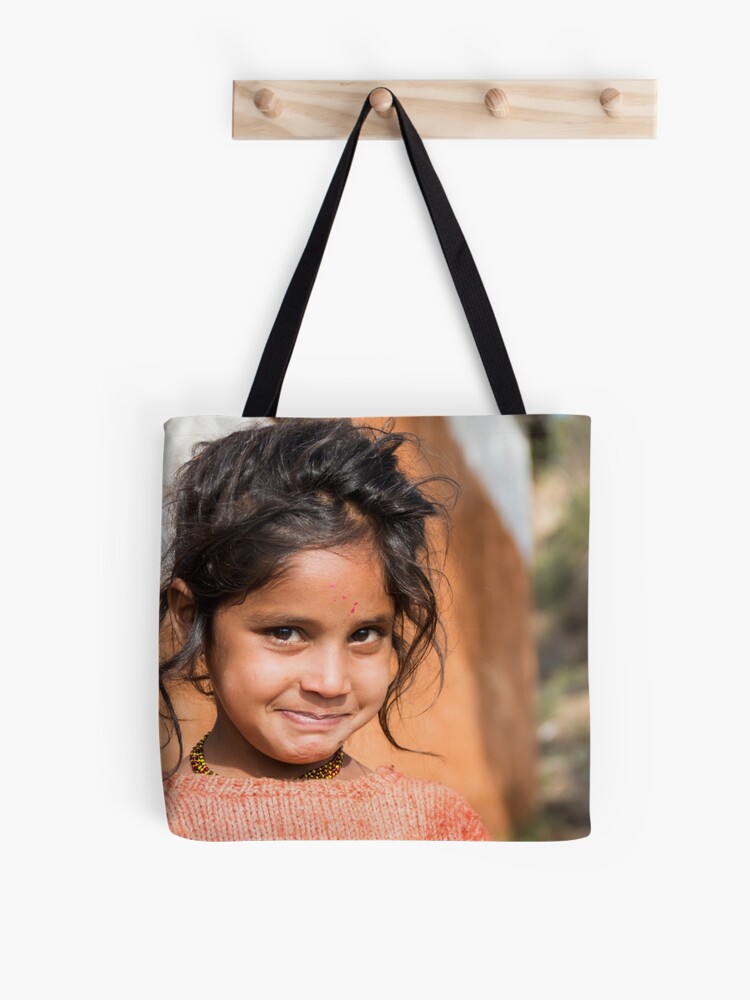 Thumbnail 1 of 2, Tote Bag, Young Girl in Nepal Far West designed and sold by missatgerebut.