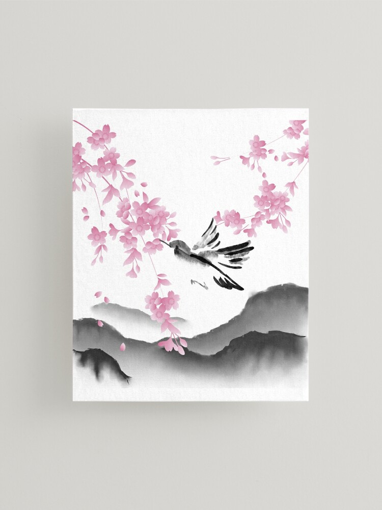 Download A bird perched on a branch of a Japanese cherry blossom