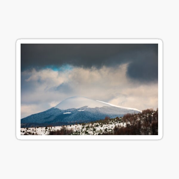 dramatic sky above the distant snowy peak Sticker