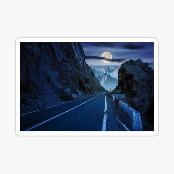 road in to the high mountains at night Sticker