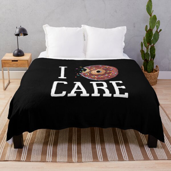 Item preview, I Donut Care - I Doughnut Care - Funny Bakery Pun designed and sold by TeesForNerds.