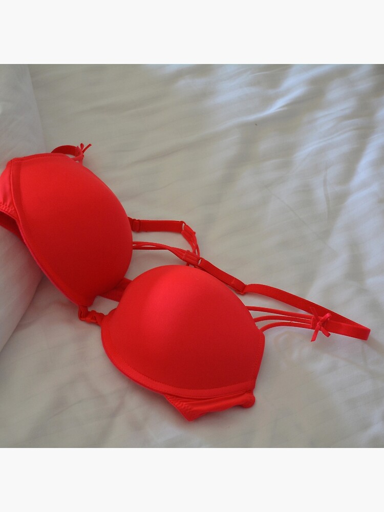 Red bra on white sheets in bed. Tote Bag for Sale by
