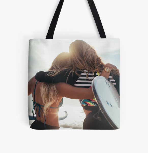 Rio de Janeiro - Two Sexy Female Surfer Girls Holding Surfboards and Hugging Each Other All Over Print Tote Bag