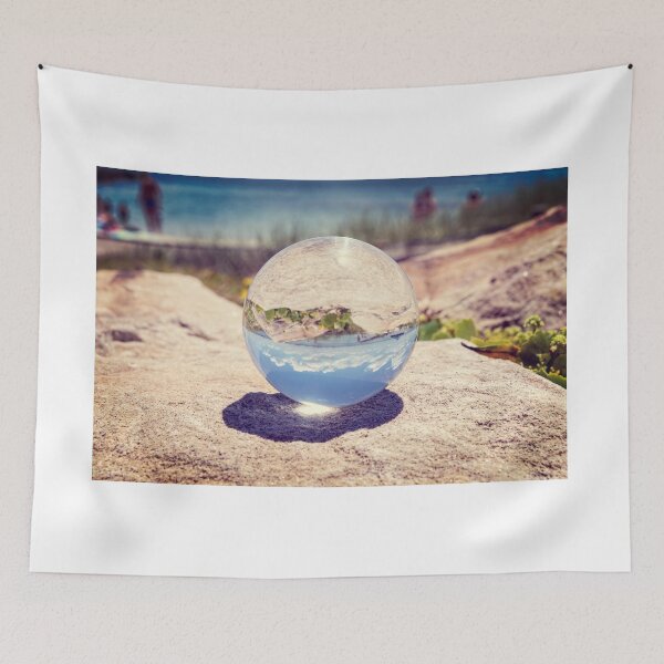 Item preview, Lensball on rocks showing beach and sky reflections designed and sold by DavidMay.