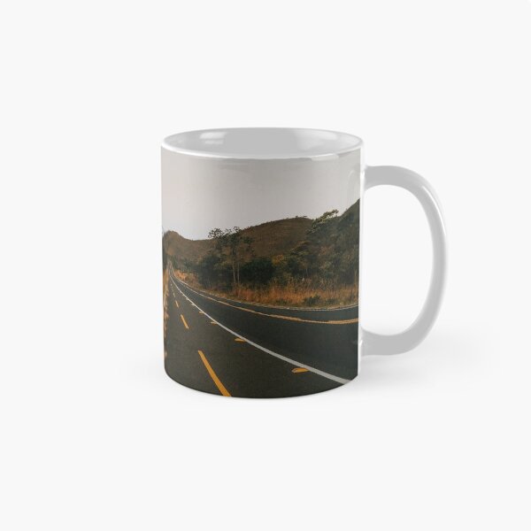 Item preview, Full Moon Over Tarmac Road in National Park designed and sold by visualspectrum.