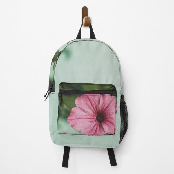 Item preview, Pink flower blossom over green defocused wall designed and sold by Claraveritas.