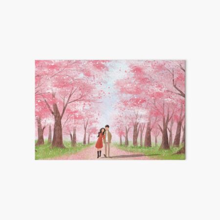 Beautiful young couple holding hands and walking through pink flowering trees. Wonderful view of spring bloom, romantic environment. Art Board Print