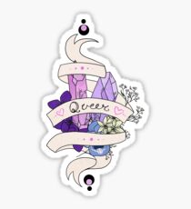 Pastel coloured gems and ribbon going around it with the words queer