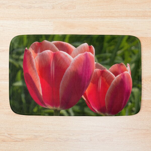 Item preview, two red tulips illuminated by the sun, on a background of green foliage designed and sold by nataliavavilina.