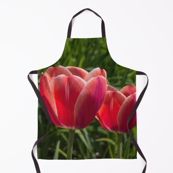 Item preview, two red tulips illuminated by the sun, on a background of green foliage designed and sold by nataliavavilina.