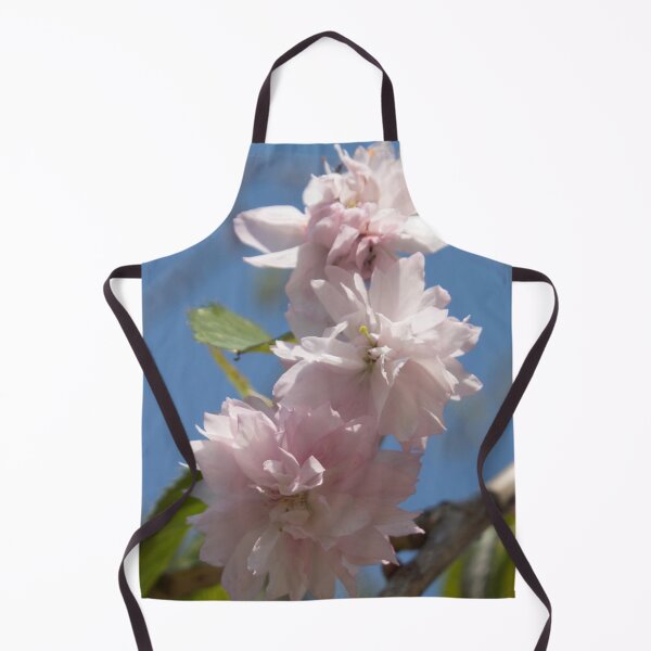 Item preview, light pink flowers on a tree branch against a blue sky background designed and sold by nataliavavilina.