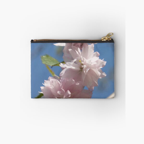 Item preview, light pink flowers on a tree branch against a blue sky background designed and sold by nataliavavilina.