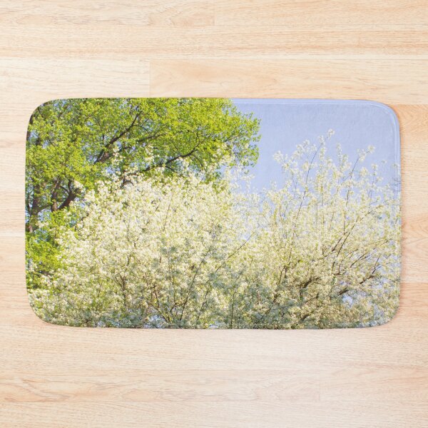 Item preview, spring blooming tree on a background of blue sky and a tree with soft green foliage designed and sold by nataliavavilina.