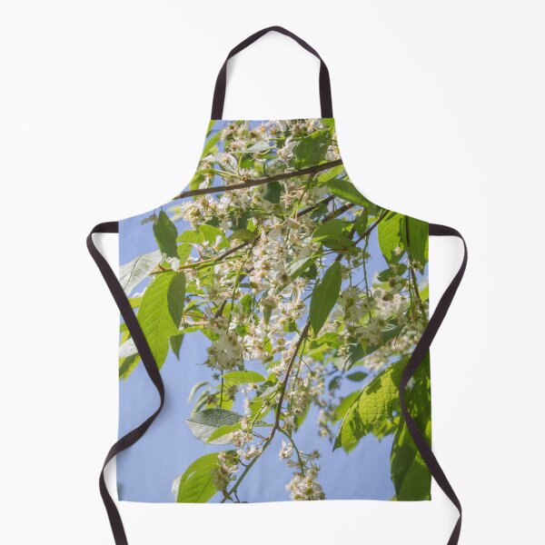 Item preview, spring cherry tree blooming with white flowers on a blue sky background designed and sold by nataliavavilina.
