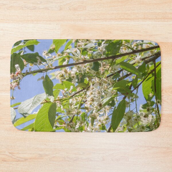 Item preview, spring cherry tree blooming with white flowers on a blue sky background designed and sold by nataliavavilina.